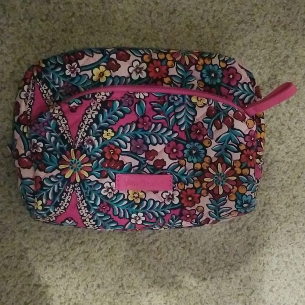 Pink Vera Bradley makeup bag.